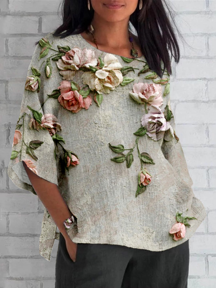 Iverra | Top Floreale Casual con Maniche Batwing 1