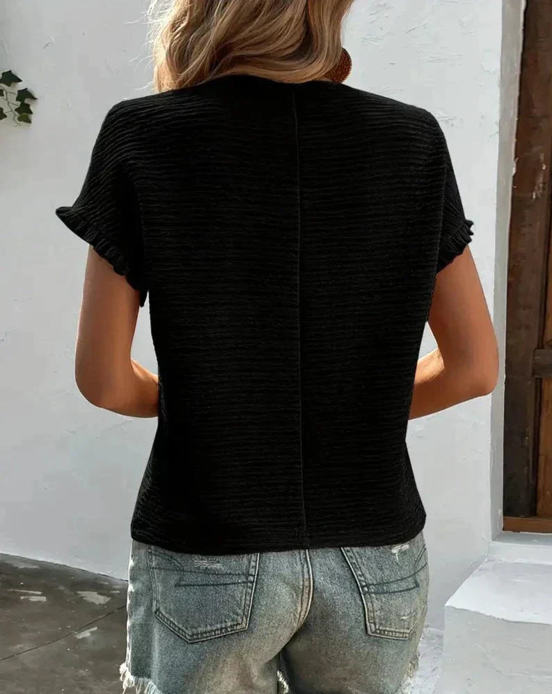 Karin | Textured top with ruffle sleeves