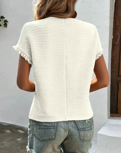 Karin | Textured top with ruffle sleeves