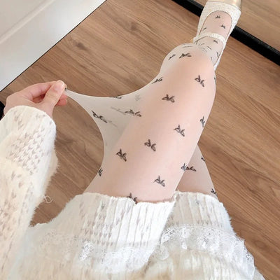Leah | Collant alla moda con motivo a cuori e pois