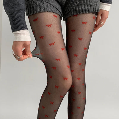 Leah | Collant alla moda con motivo a cuori e pois