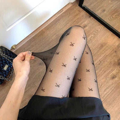 Leah | Collant alla moda con motivo a cuori e pois