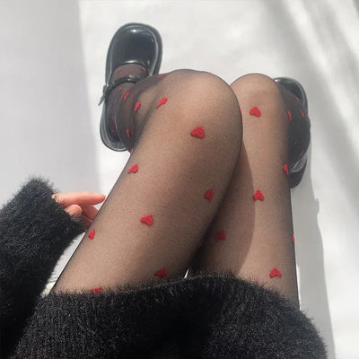 Leah | Collant alla moda con motivo a cuori e pois