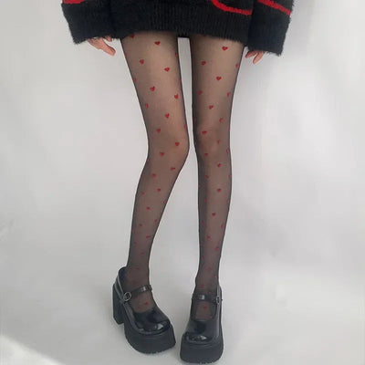 Leah | Collant alla moda con motivo a cuori e pois