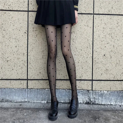 Leah | Collant alla moda con motivo a cuori e pois