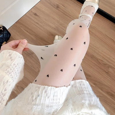 Leah | Collant alla moda con motivo a cuori e pois