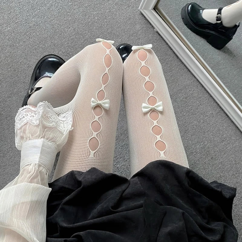 Stefanie | Collant alti fino alla coscia con dettagli a fiocco