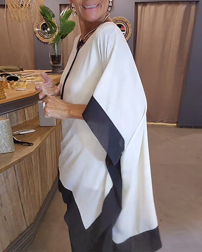 Sofia | Blusa ampia con bordi a contrasto