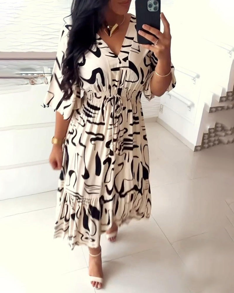 Lindi | Abito con scollo a V