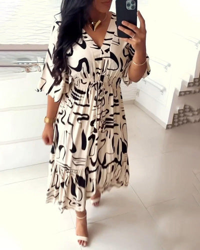 Lindi | Abito con scollo a V