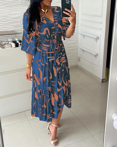 Lindi | Abito con scollo a V